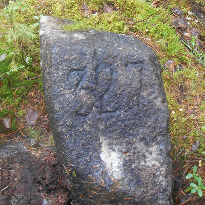 The boundary stone in Kolmikanta